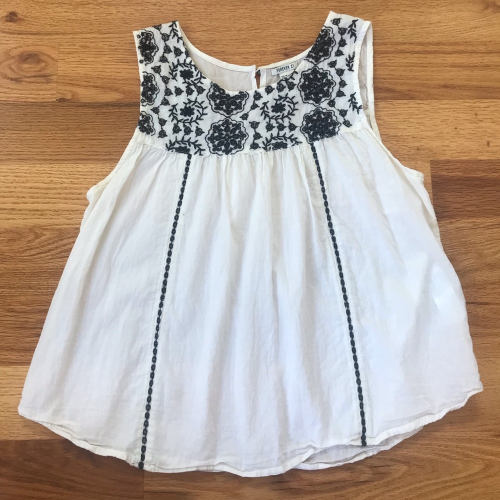Cream blouse with blue embroidery